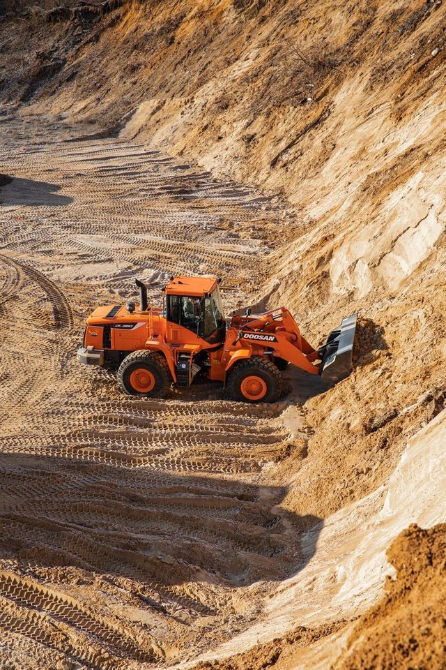 Compact loader working on site